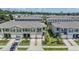 Aerial view of the community featuring well-maintained lawns and landscaping at 36414 Well Hill Way, Zephyrhills, FL 33541