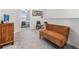 Upstairs hallway with a seating area at 36414 Well Hill Way, Zephyrhills, FL 33541