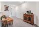 Upstairs hallway with a seating area and dark wood cabinet at 36414 Well Hill Way, Zephyrhills, FL 33541