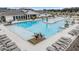 Community pool with seating, creating an inviting and luxurious resort-style ambiance for residents at 36414 Well Hill Way, Zephyrhills, FL 33541
