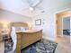 Cozy bedroom with a unique bed frame, stylish furnishings, and an inviting atmosphere at 386 Westwinds Dr, Palm Harbor, FL 34683