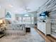 Main bedroom features a coastal theme, a bay window, and a whitewashed accent wall at 386 Westwinds Dr, Palm Harbor, FL 34683