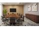 Spacious conference room with a large table, modern decor, and seating at 400 Central Ave # 808, St Petersburg, FL 33701