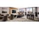 Contemporary living room boasts ample seating, TV, and cityscape views at 400 Central Ave # 808, St Petersburg, FL 33701