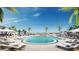 Rooftop pool and lounge area with city views and palm trees at 400 Central Ave # 808, St Petersburg, FL 33701