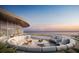 Relaxing rooftop lounge with plush seating offers a perfect place to unwind with ocean views at 400 Central Ave # 808, St Petersburg, FL 33701