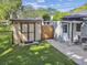View of the backyard featuring a storage shed and the back of the home at 4009 S Renellie Dr, Tampa, FL 33611