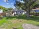 Large backyard with shed and seating area at 4009 S Renellie Dr, Tampa, FL 33611