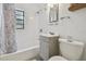Clean bathroom with subway tile, shower-tub combo and a modern vanity with stylish fixtures at 4009 S Renellie Dr, Tampa, FL 33611