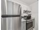 Modern kitchen features stainless steel appliances, white cabinets, and light countertops at 4009 S Renellie Dr, Tampa, FL 33611