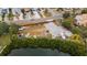 Aerial view of a community boat storage area on the water with trailers for residents at 4214 Harbor House Dr, Tampa, FL 33615