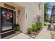 Charming front entrance featuring a decorative door wreath and well-maintained landscaping at 4214 Harbor House Dr, Tampa, FL 33615
