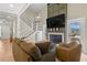 Bright living room boasting a fireplace, staircase, and seamless indoor-outdoor flow at 4214 Harbor House Dr, Tampa, FL 33615