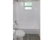 Clean bathroom featuring a tiled shower-tub at 4417 Kohler St, New Port Richey, FL 34652