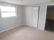 Bedroom featuring neutral carpeting and a closet at 4417 Kohler St, New Port Richey, FL 34652