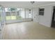 Enclosed sunroom features tiled floors and plenty of windows for natural light at 4417 Kohler St, New Port Richey, FL 34652