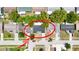 Aerial view highlights the home's location within a quiet neighborhood with mature trees at 4638 Durney St, New Port Richey, FL 34652