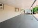 Spacious covered patio perfect for outdoor entertaining and relaxation overlooking the backyard at 4638 Durney St, New Port Richey, FL 34652