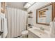 Bathroom with shower and vanity at 4735 Winslow Beacon # 14, Sarasota, FL 34235