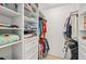 Walk-in closet with shelving and hanging storage at 4735 Winslow Beacon # 14, Sarasota, FL 34235