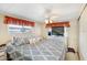 Comfortable bedroom showcasing a cozy bed and a window for natural light at 4904 Winged Foot Ave, Sarasota, FL 34234