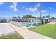 Community shuffleboard courts offering a recreational amenity in a landscaped setting at 4904 Winged Foot Ave, Sarasota, FL 34234