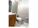 This bathroom features wood vanity and white tiled floors at 5203 Oak Charter Ct # 5203, Temple Terrace, FL 33617