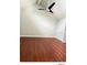 This spacious bedroom features hardwood floors, a ceiling fan, vaulted ceilings, and neutral walls at 5203 Oak Charter Ct # 5203, Temple Terrace, FL 33617
