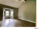 Bright living room with wood-look flooring and a cozy bay window at 5203 Oak Charter Ct # 5203, Temple Terrace, FL 33617