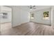 Bright bedroom with hardwood floors, crown molding, and ample natural light at 5705 N 20Th St, Tampa, FL 33610