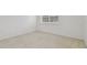 Bedroom featuring neutral carpeting, bright white walls and natural light from the window at 6234 Ashbury Palms Dr, Tampa, FL 33647