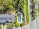 Aerial view of the community pool area, surrounded by well-manicured landscaping and palm trees at 6234 Ashbury Palms Dr, Tampa, FL 33647