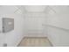 Walk-in closet featuring wire shelving for optimal storage solutions at 6234 Ashbury Palms Dr, Tampa, FL 33647