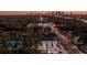 Aerial view of the townhome community with the city skyline in the background at 6605 N Nebraska Ave # 11, Tampa, FL 33604