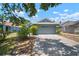 Charming single Gathering home with a two-car garage and a well-maintained lawn in a suburban neighborhood at 7534 Oxford Garden Cir, Apollo Beach, FL 33572