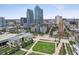 Stunning aerial view showcasing the community's prime location, surrounded by parks, city views, and modern high-rises at 777 N Ashley Dr # 2510, Tampa, FL 33602