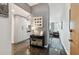 Welcoming entryway with dark floors, gray walls, and decor leading to an open living area at 777 N Ashley Dr # 2510, Tampa, FL 33602