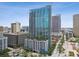 Modern high-rise condo with glass windows, and city views on a bright and sunny day at 777 N Ashley Dr # 2510, Tampa, FL 33602
