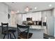 Modern kitchen with white cabinets, stainless steel appliances, and granite countertops at 777 N Ashley Dr # 2510, Tampa, FL 33602