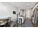 Bright kitchen with white cabinets, stainless steel appliances, and dark countertops at 777 N Ashley Dr # 2510, Tampa, FL 33602
