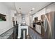 Modern kitchen with white cabinets, stainless steel appliances, and dark countertops at 777 N Ashley Dr # 2510, Tampa, FL 33602