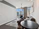 Sunlit living room with neutral walls, dark wood floors, and panoramic city views at 777 N Ashley Dr # 2510, Tampa, FL 33602