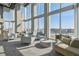 Modern lounge with floor-to-ceiling windows providing abundant natural light and panoramic city views at 777 N Ashley Dr # 2510, Tampa, FL 33602