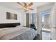 Bedroom with city views and access to a balcony, offering a relaxing space to enjoy the cityscape at 777 N Ashley Dr # 2510, Tampa, FL 33602