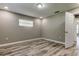 Comfortable bedroom with wood-look flooring and a light-filled window at 8330 Lafitte Dr, Hudson, FL 34667
