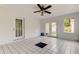 This lanai features tiled flooring and multiple windows at 8330 Lafitte Dr, Hudson, FL 34667