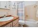 Bathroom with tub, shower, mirror and updated vanity at 8425 112Th St # 203, Seminole, FL 33772