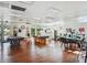 Large recreation room with pool tables, game tables and exercise equipment at 8425 112Th St # 203, Seminole, FL 33772