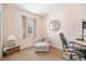Bedroom/office space features a sitting area, desk space, window, and carpet flooring at 8518 Tidal Breeze Dr, Riverview, FL 33569