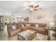 Open living room with neutral walls, ceiling fan, and comfortable seating at 8518 Tidal Breeze Dr, Riverview, FL 33569